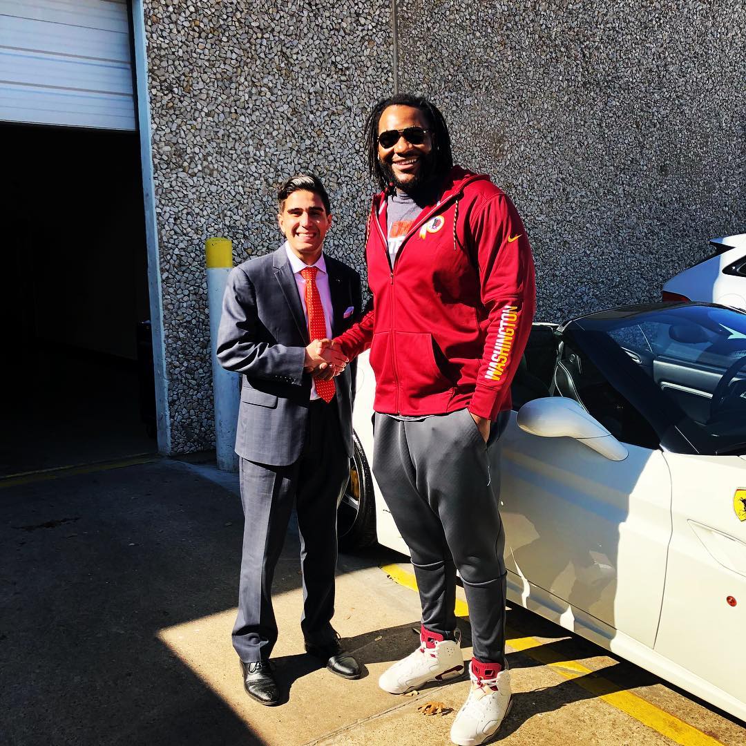 With Tyronne Sonnier (Washington)… dealership pickup day.